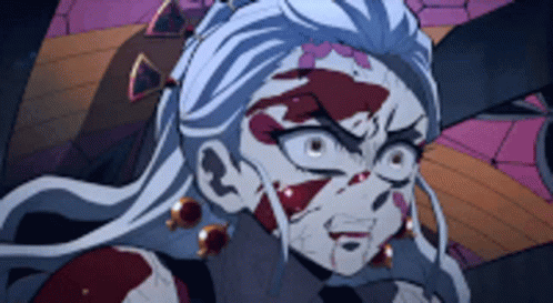 A Close Up Of A Cartoon Character With A Bloody Face . GIF