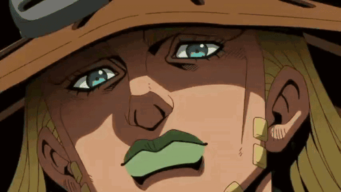 A Close Up Of A Cartoon Character With A Green Mouth GIF