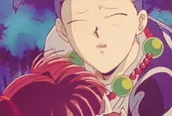 A Close Up Of A Cartoon Character With A Necklace Of Beads GIF
