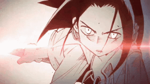 A Close Up Of A Cartoon Character With A Red Light Behind Her GIF