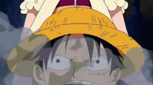 A Close Up Of A Cartoon Character With A Straw Hat On GIF