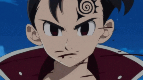 A Close Up Of A Cartoon Character With A Swirl Tattoo On His Forehead GIF