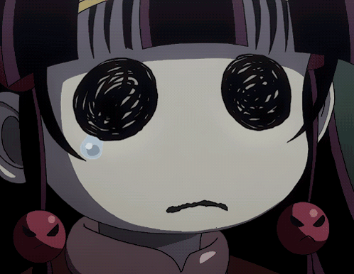 a close up of a cartoon character with a tear coming out of her eye