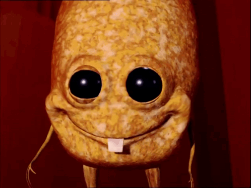 A Close Up Of A Cartoon Character With Big Eyes And A Tongue Sticking Out GIF