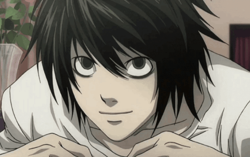 A Close Up Of A Cartoon Character With Black Hair And White Eyes GIF