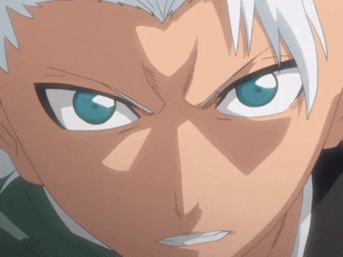 A Close Up Of A Cartoon Character With Blue Eyes GIF