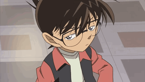 A Close Up Of A Cartoon Character With Glasses GIF