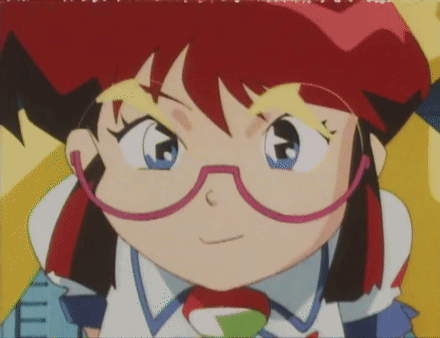 A Close Up Of A Cartoon Character With Glasses And Red Hair GIF