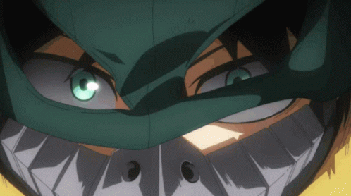 A Close Up Of A Cartoon Character With Green Eyes GIF