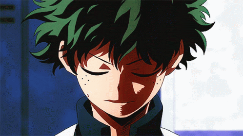 A Close Up Of A Cartoon Character With Green Hair GIF