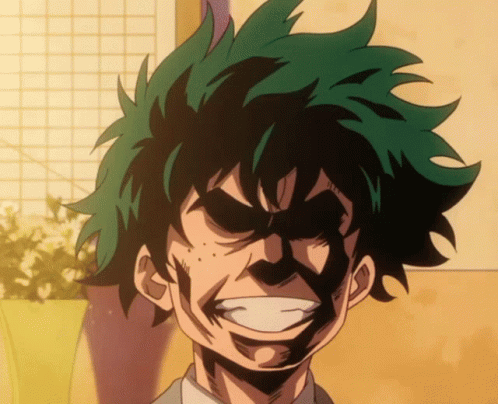 A Close Up Of A Cartoon Character With Green Hair And A Black Face GIF