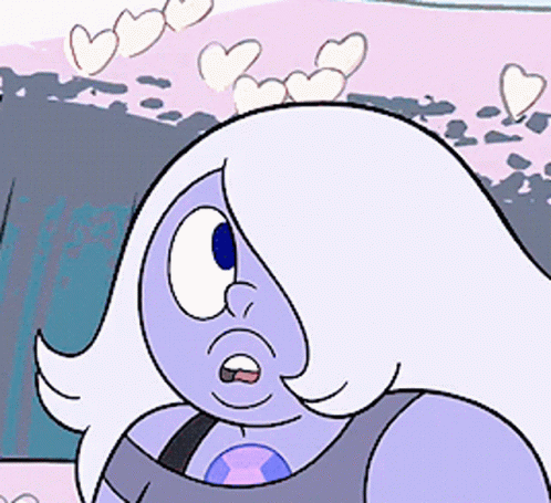 A Close Up Of A Cartoon Character With Hearts Coming Out Of Her Hair GIF