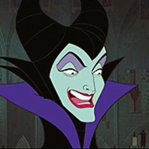 A Close Up Of A Cartoon Character With Horns And A Purple Collar GIF