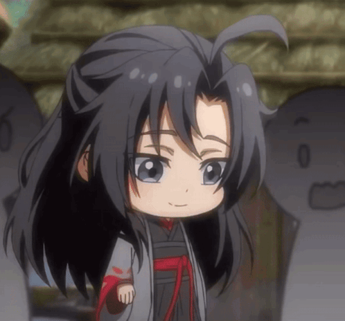 A Close Up Of A Cartoon Character With Long Black Hair And Blue Eyes GIF