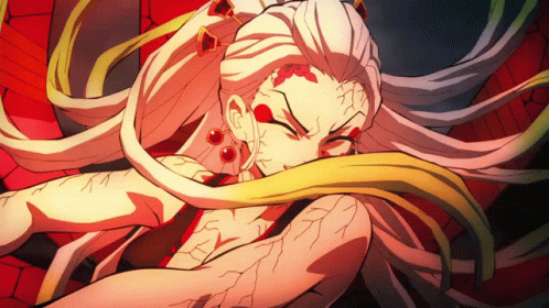 A Close Up Of A Cartoon Character With Long White Hair GIF