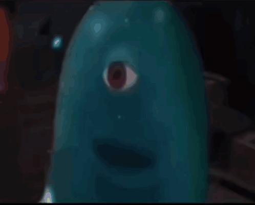 A Close Up Of A Cartoon Character With One Eye GIF