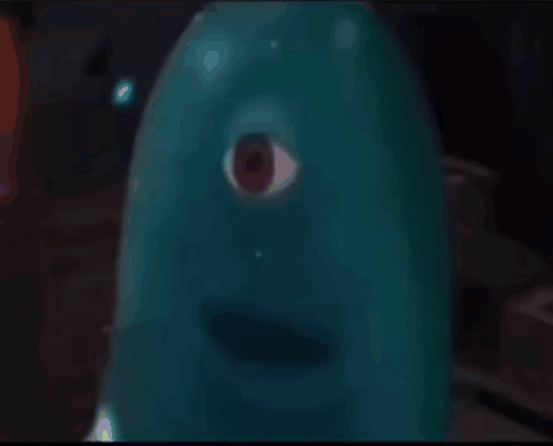 A Close Up Of A Cartoon Character With One Eye GIF