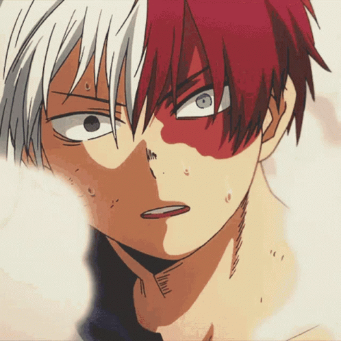 A Close Up Of A Cartoon Character With Red And White Hair GIF