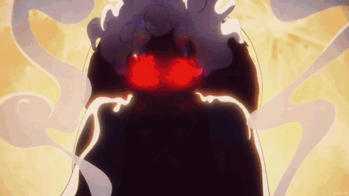 A Close Up Of A Cartoon Character With Red Eyes GIF