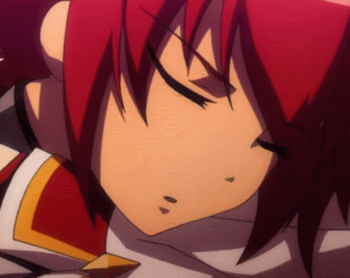 A Close Up Of A Cartoon Character With Red Hair GIF