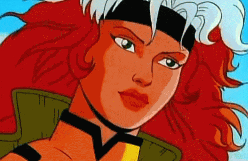 A Close Up Of A Cartoon Character With Red Hair And A Headband On Her Head . GIF