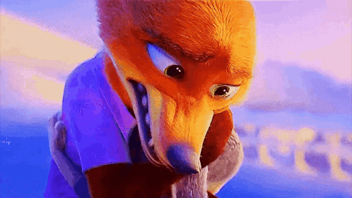 A Close Up Of A Cartoon Fox Wearing A Purple Shirt And A Purple Shirt . GIF