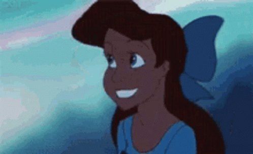 A Close Up Of A Cartoon Girl With A Blue Bow On Her Head . GIF