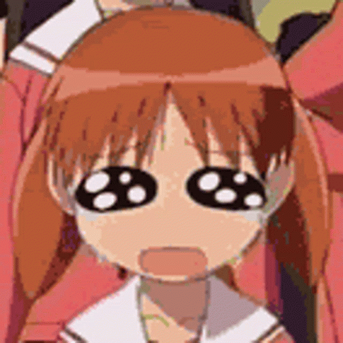 A Close Up Of A Cartoon Girl With Big Eyes Making A Surprised Face . GIF
