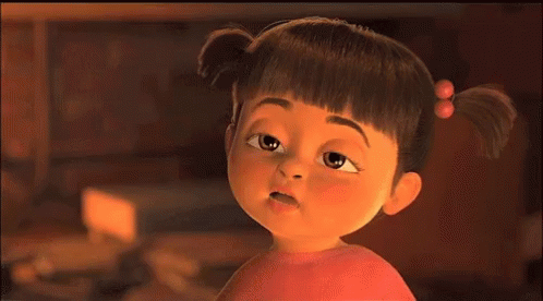 A Close Up Of A Cartoon Girl With Pigtails Looking At The Camera GIF