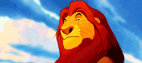 A Close Up Of A Cartoon Lion With A Blue Sky Behind Him GIF