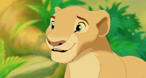 A Close Up Of A Cartoon Lioness Smiling GIF