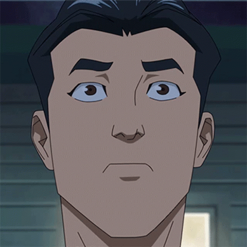 a close up of a cartoon man 's face with a serious look on his face