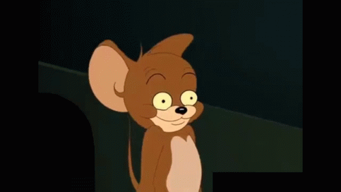 A Close Up Of A Cartoon Mouse With Big Yellow Teeth GIF