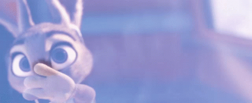 A Close Up Of A Cartoon Rabbit With Big Eyes GIF