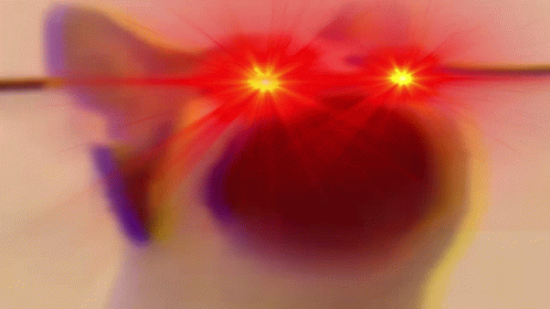 A Close Up Of A Cat 'S Eyes With Red And Yellow Lights Coming Out Of Them . GIF