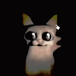 A Close Up Of A Cat With Big Eyes And A Smile On Its Face In The Dark . GIF
