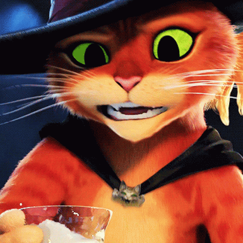 A Close Up Of A Cat With Green Eyes Holding A Glass GIF