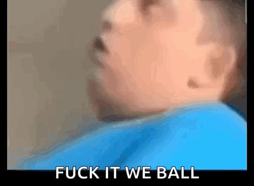 a close up of a child 's face with the words fuck it we ball written below it