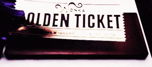 A Close Up Of A Chocolate Bar That Says Golden Ticket On It GIF