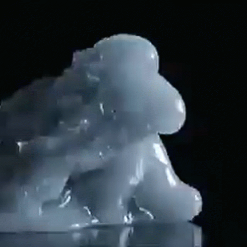 A Close Up Of A Cloud Of Liquid On A Black Background GIF