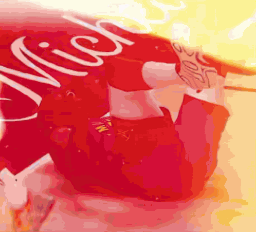 a close up of a coca cola can that says much on it