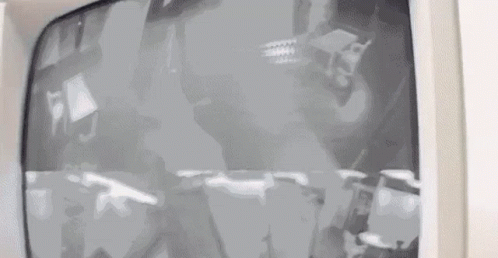 A Close Up Of A Computer Monitor With A Gray Screen And A Gray Background . GIF