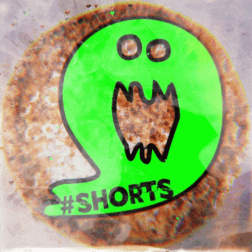 A Close Up Of A Cookie That Says Shorts GIF