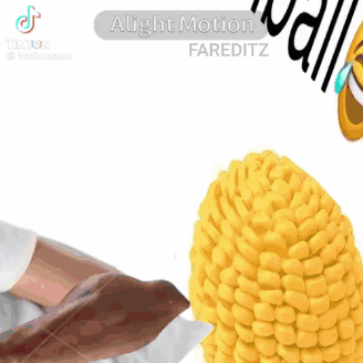 A Close Up Of A Corn On The Cob With A Person 'S Ear On It . GIF