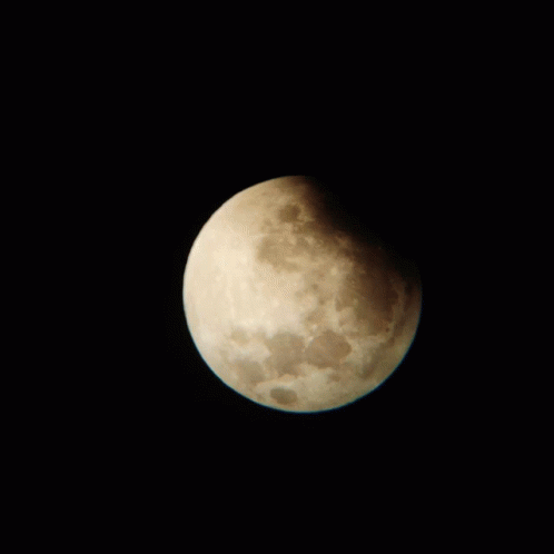 A Close Up Of A Crescent Moon In The Night Sky GIF