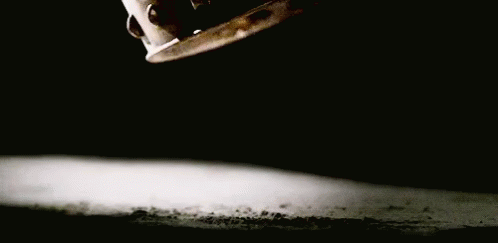 A Close Up Of A Crown Laying On A Table GIF