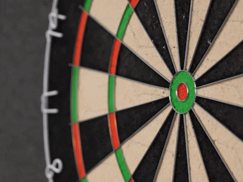 A Close Up Of A Dart Board With The Number 8 Written On It GIF