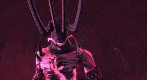 A Close Up Of A Demon 'S Hand With Sharp Teeth GIF