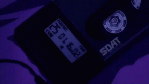 A Close Up Of A Device With A Purple Background And A Purple Screen . GIF