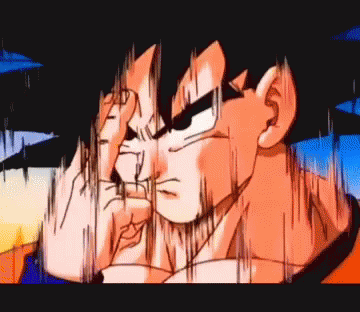 a close up of a dragon ball z character covering his face with his hands